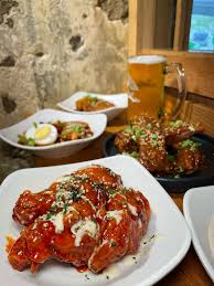 Anju signature dishes Whole Fried Chicken, Kimchi Fried Rice, Jjajangmyeon, Oxtail